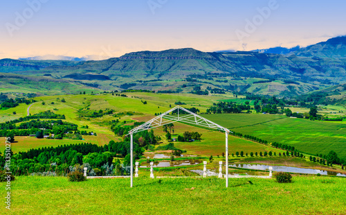 Obraz na płótnie Drakensberg mountain and the valley below viewed from a chapel during sunset, KwaZulu-Natal, South Africa w salonie
