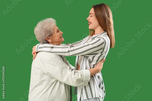 Young woman hugging her gra...