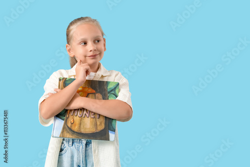 Funny little girl with book...