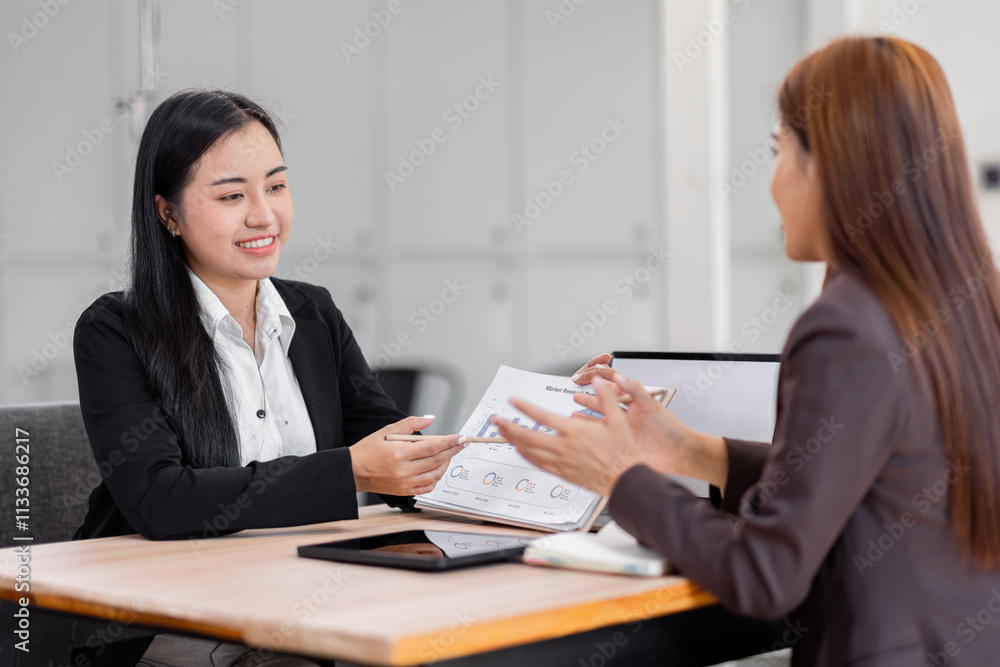 Business financing accounting banking concept. Two asian Business doing finances and calculate on desk about cost at workplace. Business working on desk with using calculator, finance accounting.
Business financing accounting banking concept. Two asian Business doing finances and calculate on desk about cost at workplace. Business working on desk with using calculator, finance accounting.