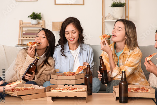 Female friends eating peppe...