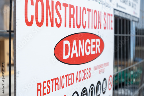 a sign at a construction site with restricted access. The text that reads 