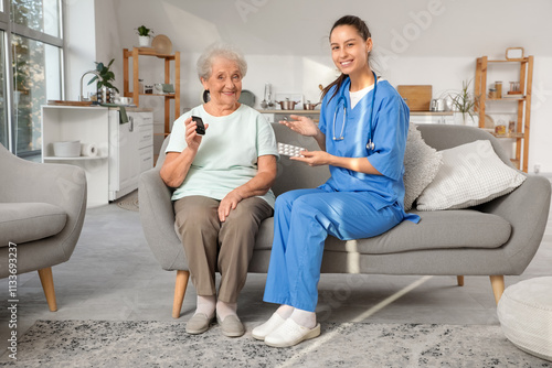 Elderly woman receiving med...