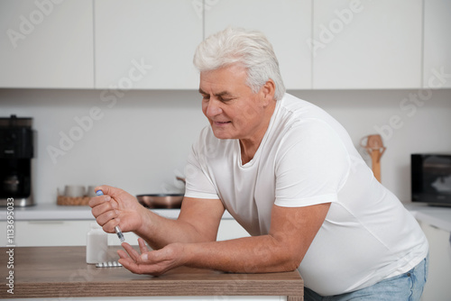 Diabetic mature man using l...