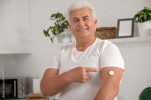 Diabetic mature man pointin...
