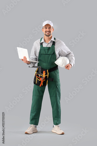 Male technician with hardha...