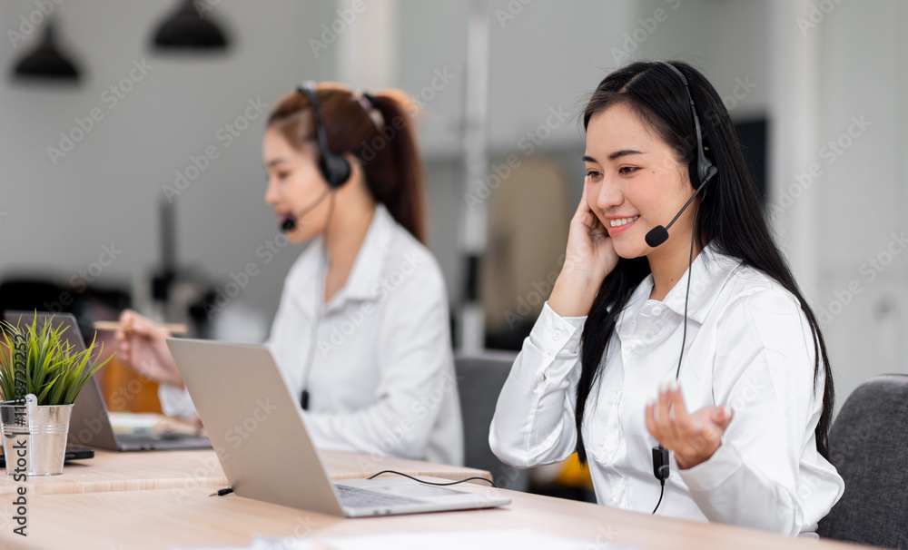 Asian call center team, customer service, telesales wearing headset or headphone talking with customer in the office. Customer Service Representative, Service, Call Center, Asian call center team, customer service, telesales wearing headset or headphone talking with customer in the office. Customer Service Representative, Service, Call Center,