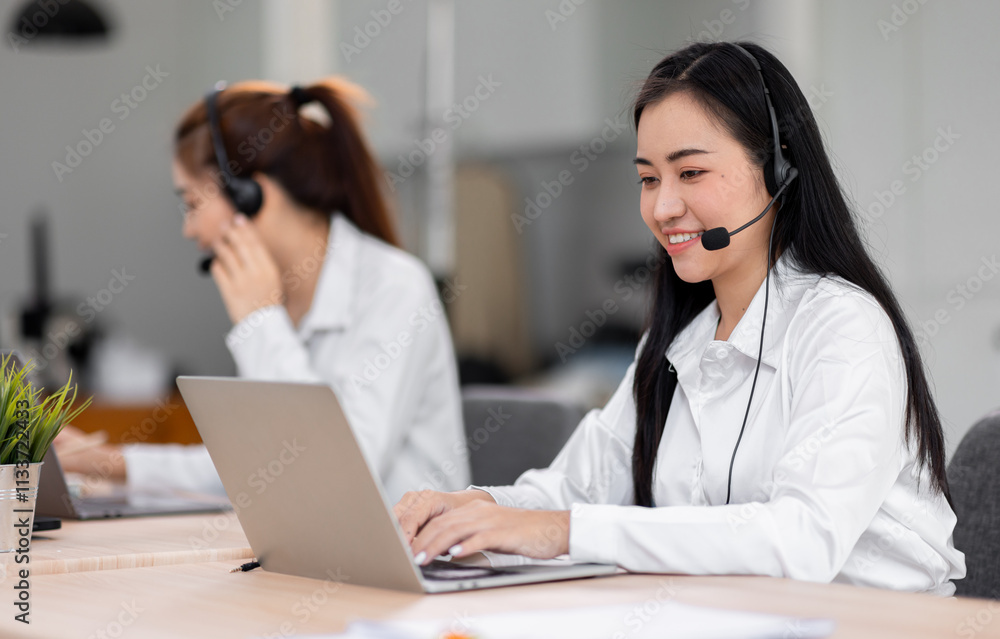 Asian call center team, customer service, telesales wearing headset or headphone talking with customer in the office. Customer Service Representative, Service, Call Center, Asian call center team, customer service, telesales wearing headset or headphone talking with customer in the office. Customer Service Representative, Service, Call Center,