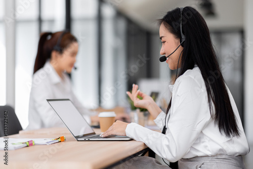 Asian call center team, customer service, telesales wearing headset or headphone talking with customer in the office. Customer Service Representative, Service, Call Center, 