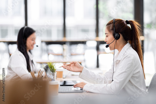 Asian call center team, customer service, telesales wearing headset or headphone talking with customer in the office. Customer Service Representative, Service, Call Center, 