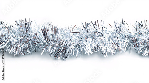 silver tinsel garland christmas decoration on white background  isolated macro photography