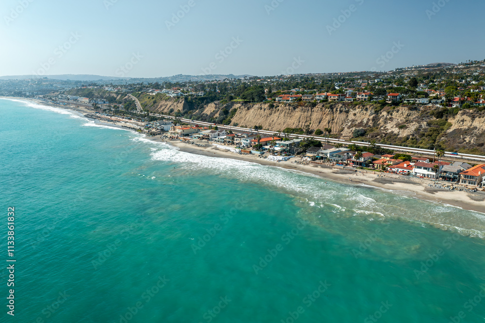 Aerial view of the tropical San Clemente coastline showcasing pristine beaches and lush landscape Aerial view of the tropical San Clemente coastline showcasing pristine beaches and lush landscape