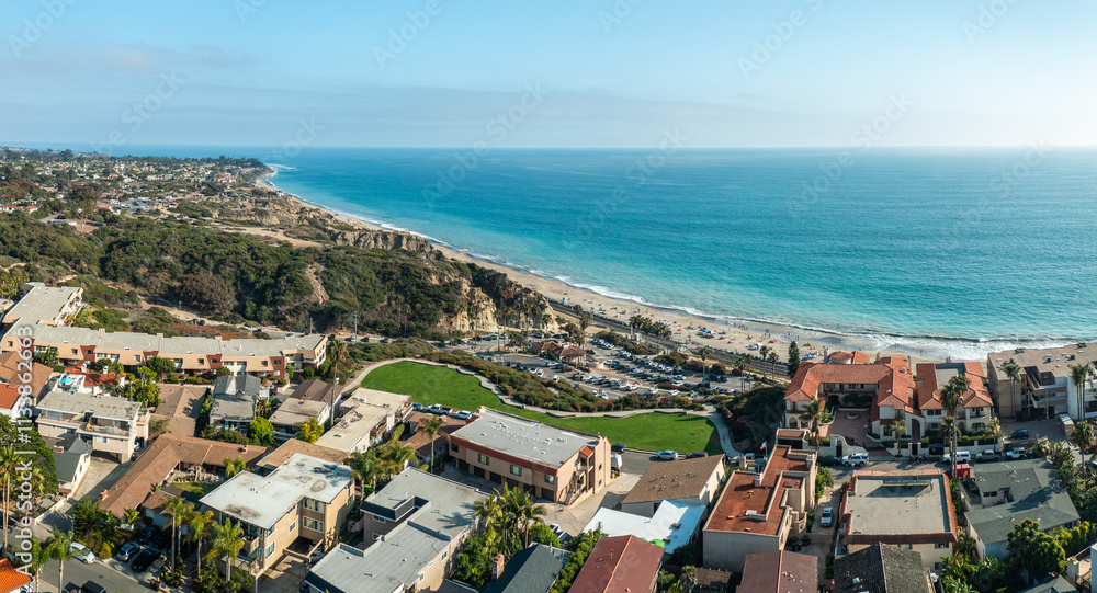Stunning coastal view over The Loop of San Clemente, California showcasing the beach and ocean from above Stunning coastal view over The Loop of San Clemente, California showcasing the beach and ocean from above