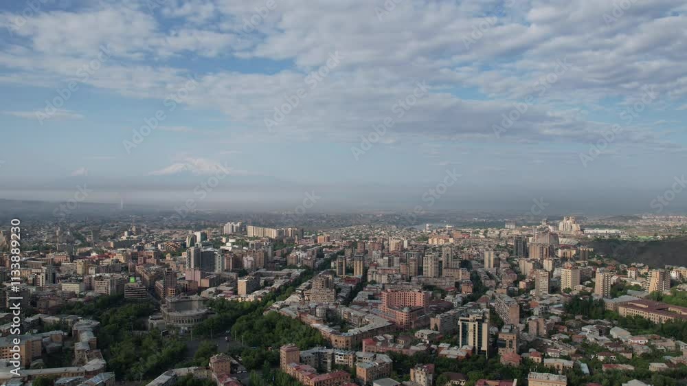 Time laps of clouds floating above central part of Yerevan and Mount Ararat on a sunny summer morning. Armenia. Time laps of clouds floating above central part of Yerevan and Mount Ararat on a sunny summer morning. Armenia.