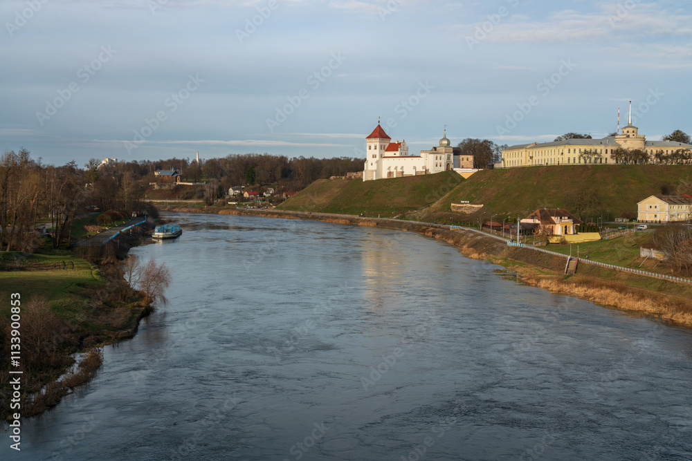 Fototapeta premium View of the Grodno Old Castle (Grodno Upper Castle) and the New Royal Palace on the banks of the Neman River on a sunny day, Grodno, Belarus