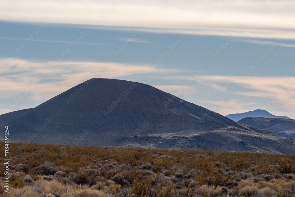 Cinder Cone / Scoria Cone with Lava Flow. Cima volcanic field. Kelbaker Road, Mojave National Preserve. San Bernardino County, California. Mojave Desert / Basin and Range Province. Cinder Cone / Scoria Cone with Lava Flow. Cima volcanic field. Kelbaker Road, Mojave National Preserve. San Bernardino County, California. Mojave Desert / Basin and Range Province.