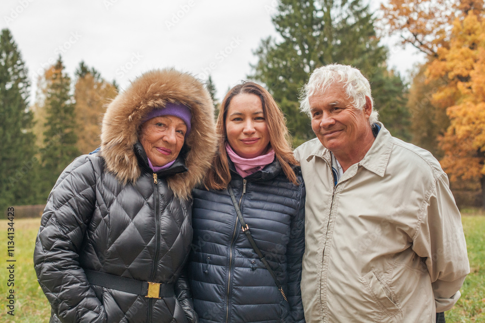 Happy family. Smiling grandma, grandpa and daughter with smile in joyful happiness, love or care for elderly parents Happy family. Smiling grandma, grandpa and daughter with smile in joyful happiness, love or care for elderly parents