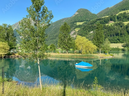 Islet Lungern from a bird's eye view at Lungern Lake or Lungerensee - Canton of Obwalden, Switzerland (Inseli Lungern aus der Vogelperspektive am Lungernsee - Kanton Obwald, Schweiz) photo