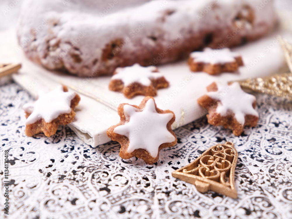 Christmas cookies (cinnamon stars) on bright background. Soft focus. Close up Christmas cookies (cinnamon stars) on bright background. Soft focus. Close up