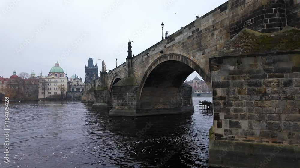 Tourist Charles Bridge over the Vltava River where tourists from the city are concentrated. Tourist Charles Bridge over the Vltava River where tourists from the city are concentrated.