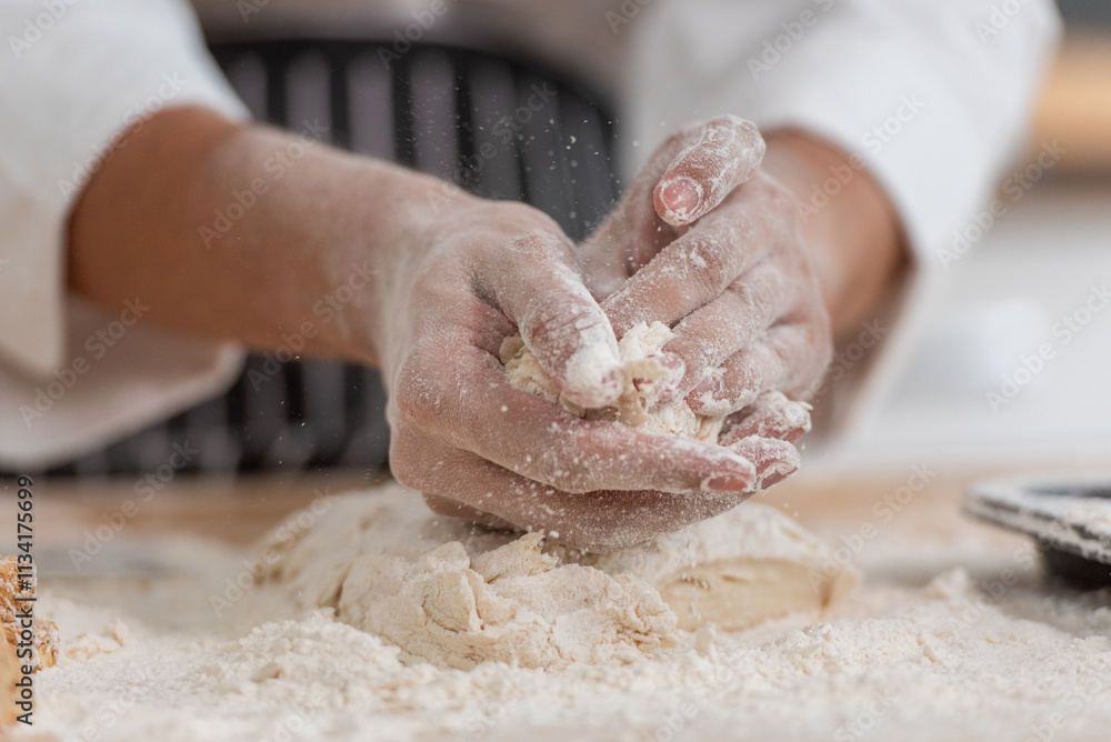 Person is making muffins in a muffin pan Person is making muffins in a muffin pan