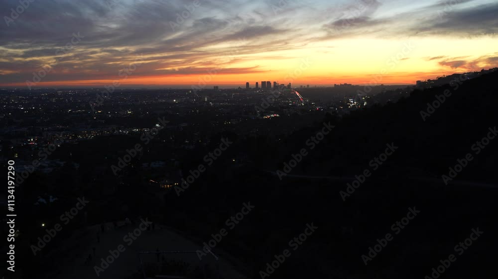 Rotating panoramic view capturing Los Angeles skyline as dusk settles over the city.