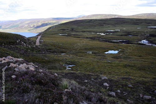Obraz na plátně Trail between Broad Cairn summit, Loch Muick and Spittal of Glenmuick in the bac