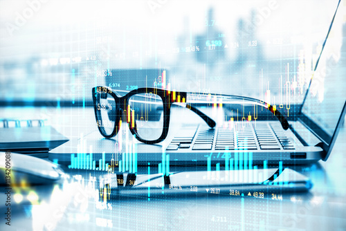 Tableau sur toile Financial market chart with glasses and laptop on desk, concept of analysis and growth