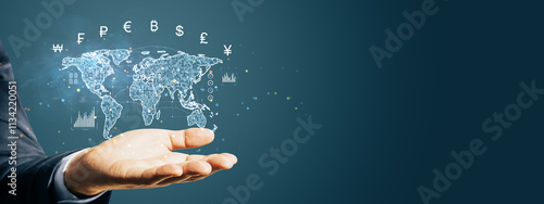 Digital world map with currency symbols floating over a hand on dark background. Concept of global finance, transactions, and fintech.