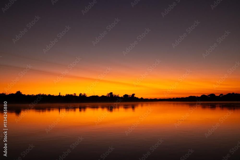 Colourful Sunrise over the Pantanal river in Brazil Colourful Sunrise over the Pantanal river in Brazil