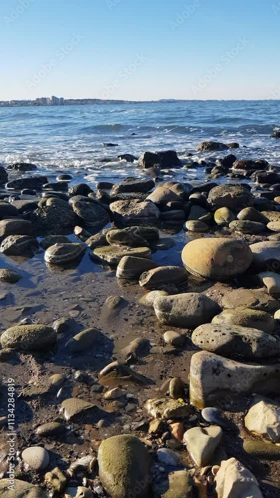 Waves of the Mediterranean Sea run to the stone shore Waves of the Mediterranean Sea run to the stone shore