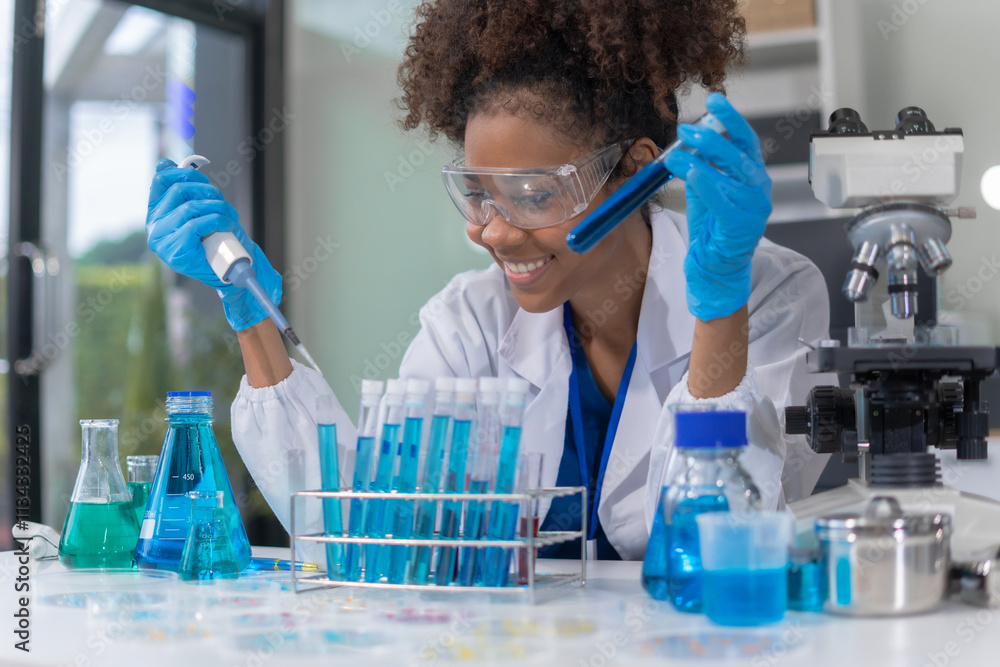 Scientist mixing chemical liquids in the chemistry lab. Researcher working in the chemical laboratory. Scientist mixing chemical liquids in the chemistry lab. Researcher working in the chemical laboratory.