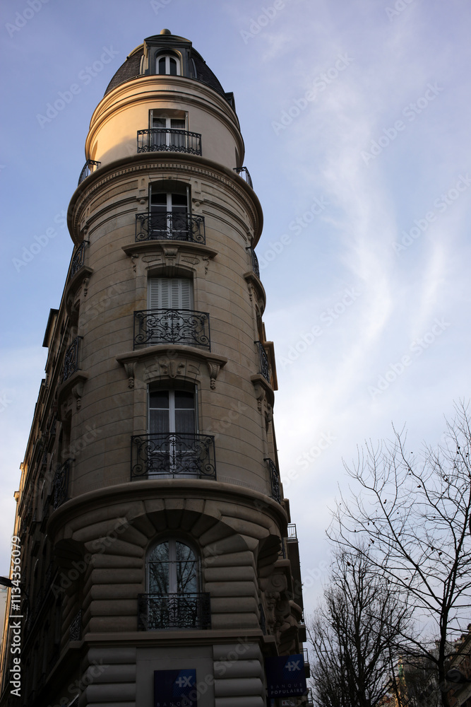 Rounded building at the angle between rue des pyrenees and rue du retrait - Belleville - 20th arrondissement - Paris - France Rounded building at the angle between rue des pyrenees and rue du retrait - Belleville - 20th arrondissement - Paris - France