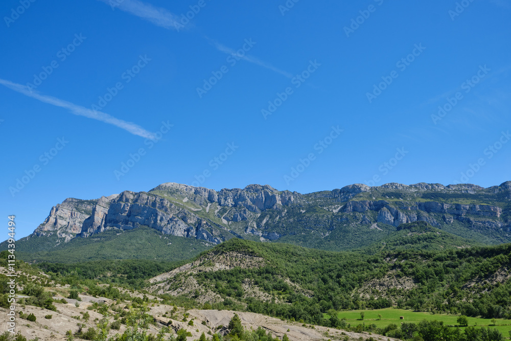 Peña Montañesa (Sierra Ferrera), limestone mountain in the Pre-Pyrenees, Aínsa-Sobrarbe, province of Huesca, Aragón, Spain. Peña Montañesa (Sierra Ferrera), limestone mountain in the Pre-Pyrenees, Aínsa-Sobrarbe, province of Huesca, Aragón, Spain.