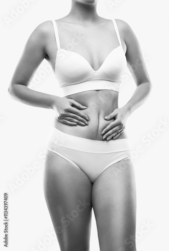 Bild auf Leinwand Girl pulls the skin showing the body fat