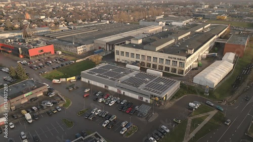 Siauliai, Lithuania - 17th november, 2024: Aerial View of Lidl Store with Solar Panels and Parking Lot