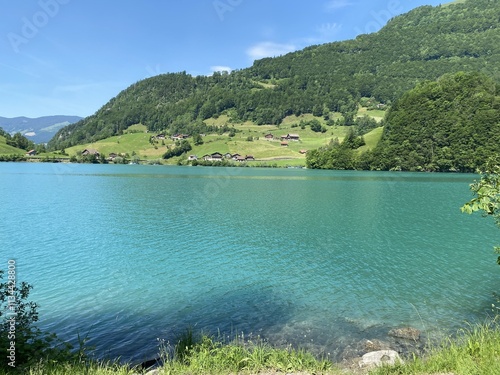 Lake Lungern or Natural reservoir Lungerersee - Canton of Obwald, Switzerland (Naturstausee Lungernsee oder Lungerensee - Kanton Obwald, Schweiz) photo