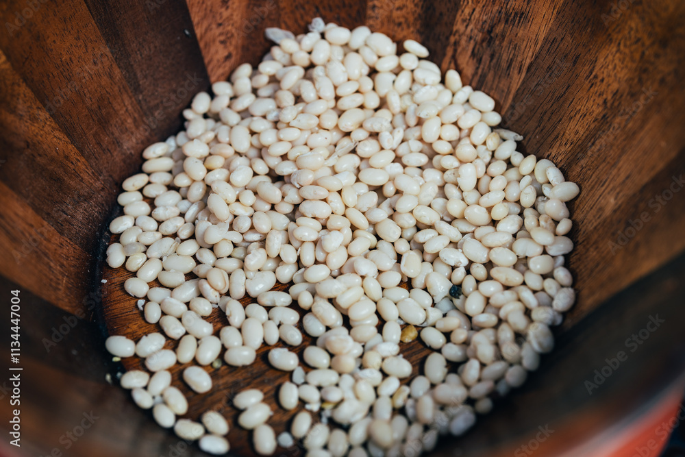 Soybeans in a tray of several grains are a vegetable and cooking ingredient in Asian markets and are very nutritious and beneficial to the body. People like to eat them as a protein meal. Soybeans in a tray of several grains are a vegetable and cooking ingredient in Asian markets and are very nutritious and beneficial to the body. People like to eat them as a protein meal.