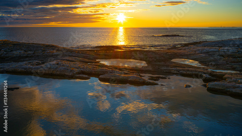 Atlantikstraße in Norwegen im Sonnenuntergang photo