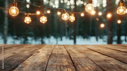 A rustic wooden table adorned with glowing string lights, set amidst a tranquil forest backdrop, creating a warm and inviting atmosphere ideal for gatherings. photo