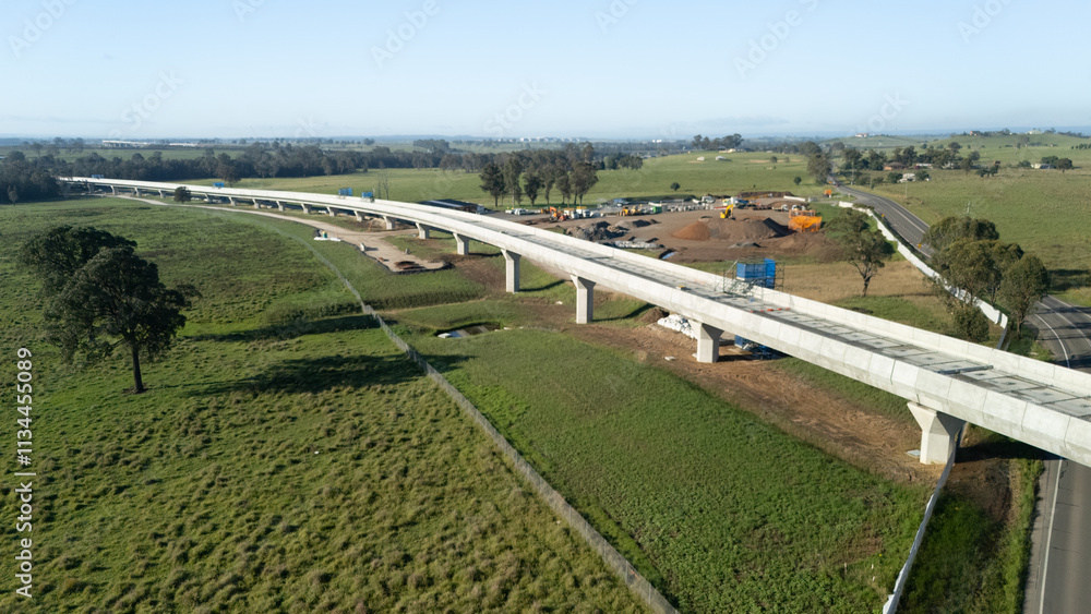 Aerial drone view of the construction of the viaduct for the new metro line looking in the east direction in Western Sydney, NSW Australia on a sunny day in December 2024 Aerial drone view of the construction of the viaduct for the new metro line looking in the east direction in Western Sydney, NSW Australia on a sunny day in December 2024