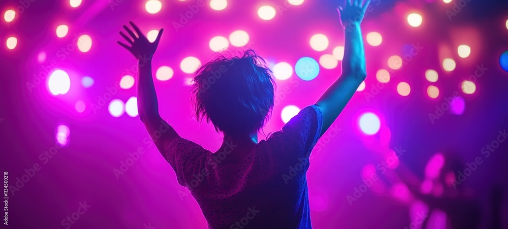 Silhouette of a Person Enjoying a Vibrant Concert Silhouette of a Person Enjoying a Vibrant Concert
