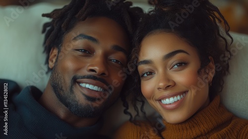 A joyful couple smiling together, showcasing happiness and connection.