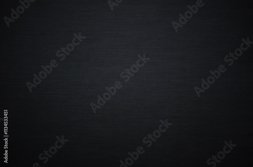 Black paper or cardboard texture as background	
