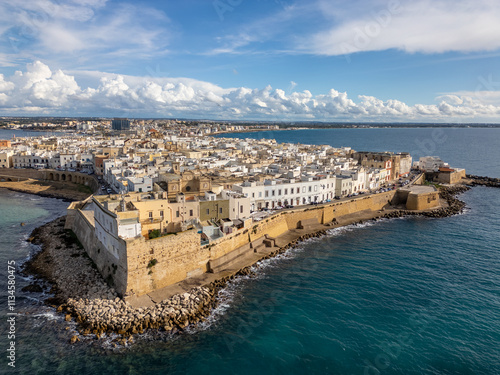 Tableau sur toile Aerial drone view of the coastal town named Gallipoli at the mediterranean sea in Italy