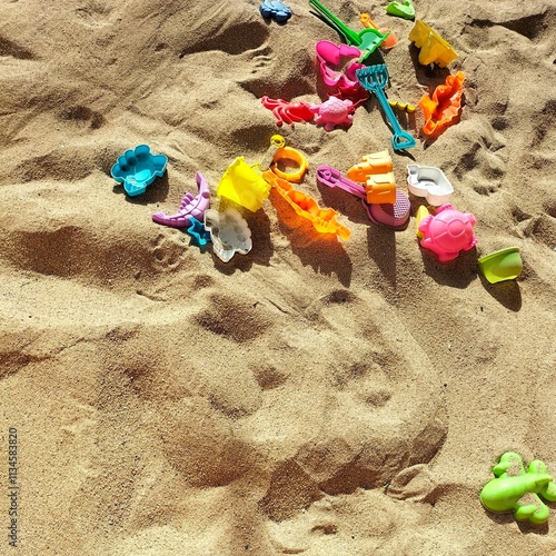 Colourful toys on the sea sand