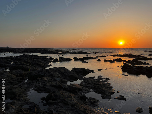 Sunset on the beach at Madh Island, Mumbai | Madh Island Mumbai | golden sunset on the beach | silver beach | arabian sea | mumbai beach | waves of water in the sea | sunset on the seashore 