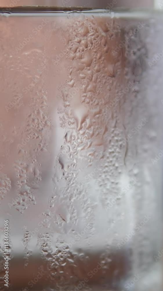 Throw ice cubes in empty glass. Ice Cubes falling down in empty transparent glass. Make a fresh drink. Footage b roll scene 4k. Slow motion. Throw ice cubes in empty glass. Ice Cubes falling down in empty transparent glass. Make a fresh drink. Footage b roll scene 4k. Slow motion.