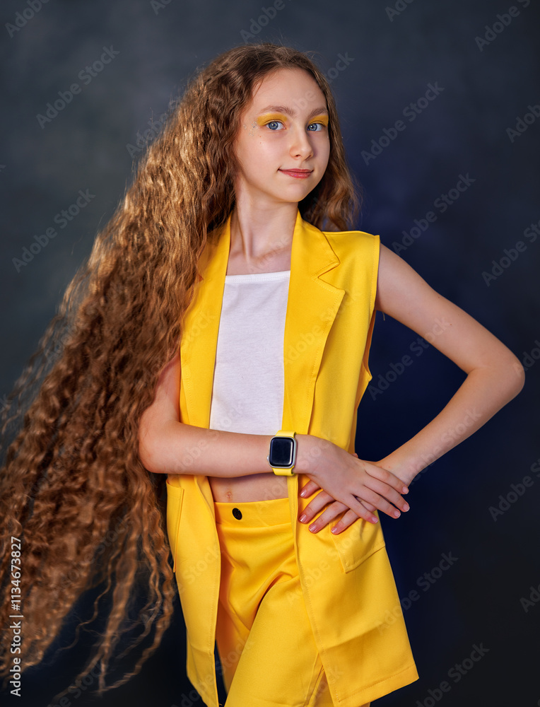 Portrait of a emotional beautiful girl kid isolated on black background. Teen girl in studio shot. Advertising child