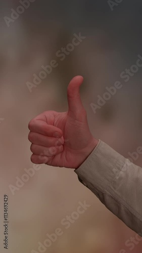 Wallpaper Mural The Thumbs Up Gesture is a widely recognized sign of positive feedback and approval Torontodigital.ca